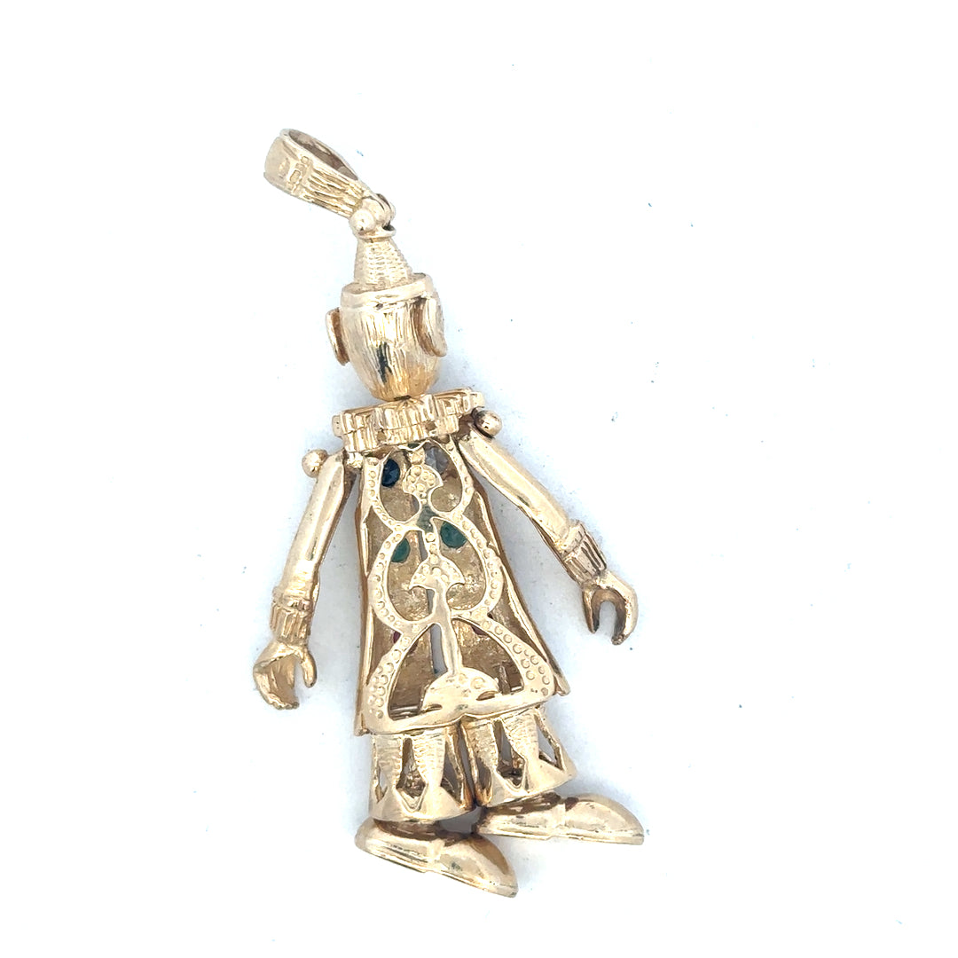 9ct yellow gold clown pendant with detailed design, weighing 20.3 grams, unbranded jewelry accessory.