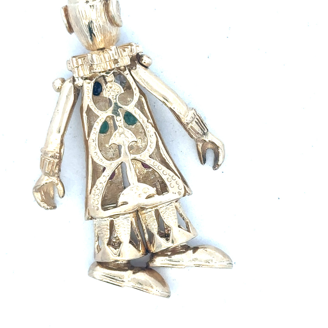 9ct yellow gold clown pendant weighing 20.3g, unbranded, featuring a detailed clown design on a chain.