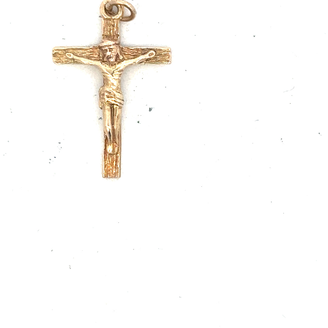 9ct yellow gold cross pendant weighing 1.6g, unbranded jewelry with detailed design, shown on a plain background.