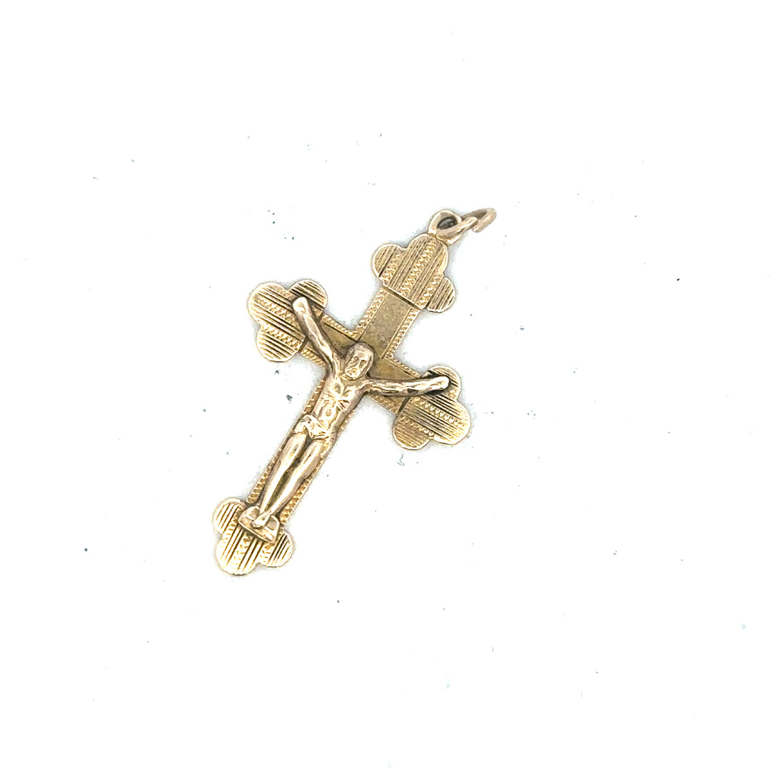 9ct yellow gold cross pendant weighing 2.7g, featuring a classic design and polished finish, ideal for jewelry and religious accessories.