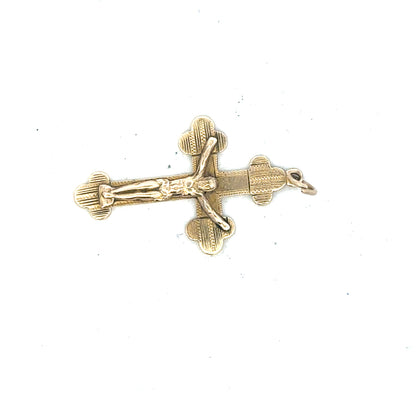 9ct yellow gold cross pendant weighing 2.7g, featuring a classic design, displayed on a neutral background.