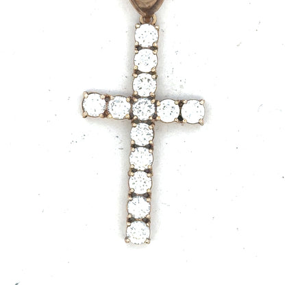 9ct yellow gold cross pendant weighing 5.1g, unbranded jewelry with detailed design, suitable for necklace or chain.