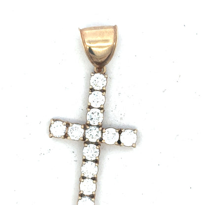 9ct yellow gold cross pendant weighing 5.1g, unbranded jewelry piece with detailed design, displayed on a neutral background.