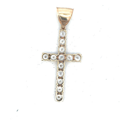 9ct yellow gold cross pendant weighing 5.1g, unbranded jewelry piece with detailed cross design on a plain background.