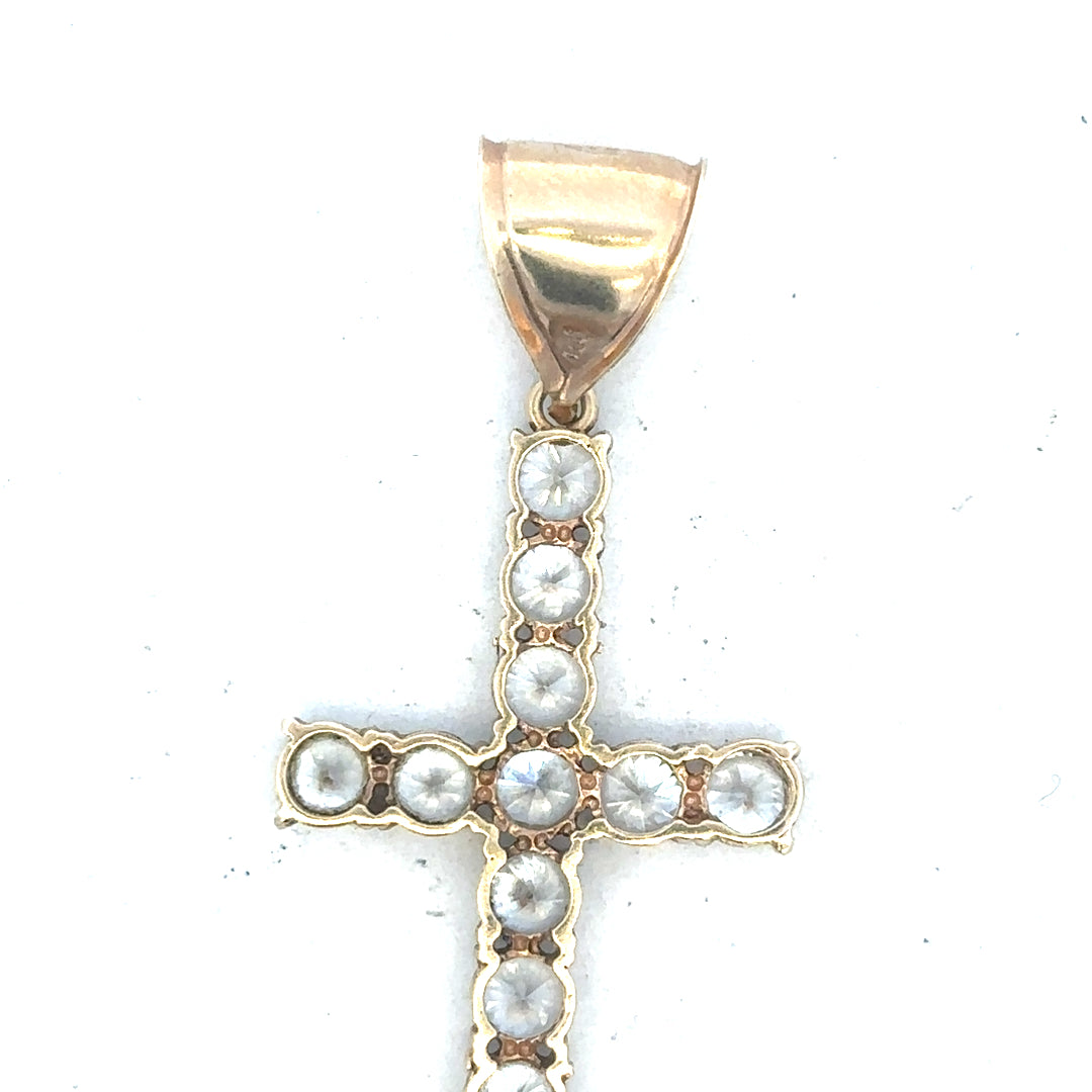 9ct yellow gold cross pendant weighing 5.1g, unbranded, with detailed design visible on a plain background.