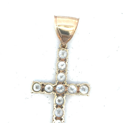 9ct yellow gold cross pendant weighing 5.1g, unbranded, with detailed design visible on a plain background.
