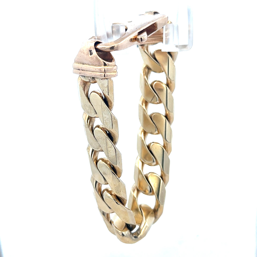 9ct yellow gold curb bracelet, unbranded, with a weight of 127g, shown in a close-up image highlighting the chain links.