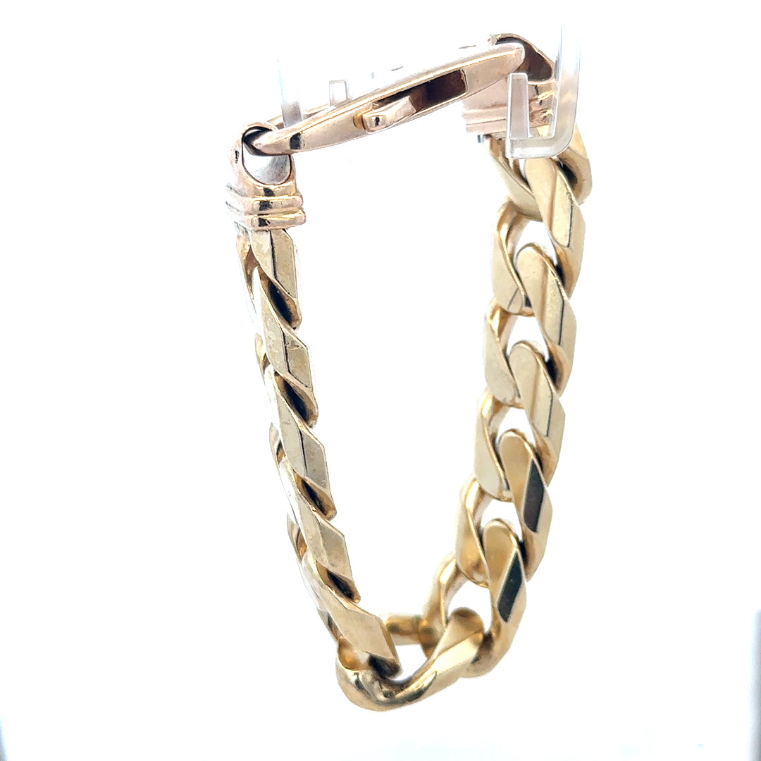 9ct yellow gold curb bracelet weighing 127g, featuring interlinked gold links, unbranded jewelry accessory.