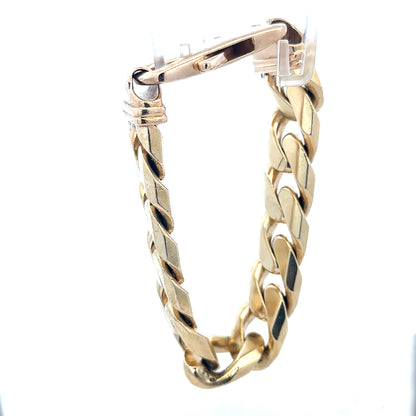 9ct yellow gold curb bracelet weighing 127g, featuring interlinked gold links, unbranded jewelry accessory.