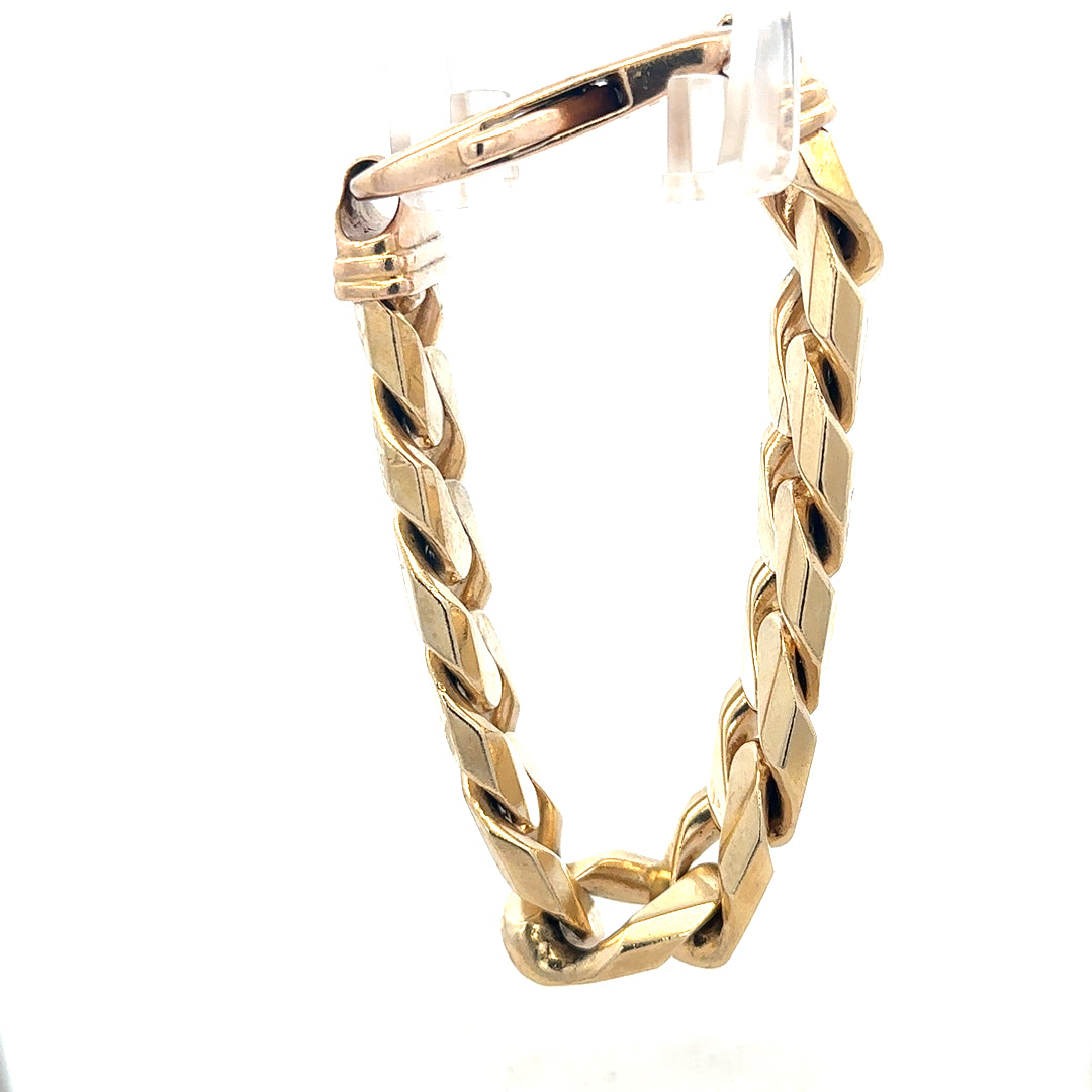 9ct yellow gold curb bracelet weighing 127g, featuring classic linked chain design, unbranded jewelry accessory.