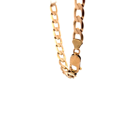 9ct yellow gold curb bracelet weighing 13.2g, shown in close-up with polished gold links on a plain background.