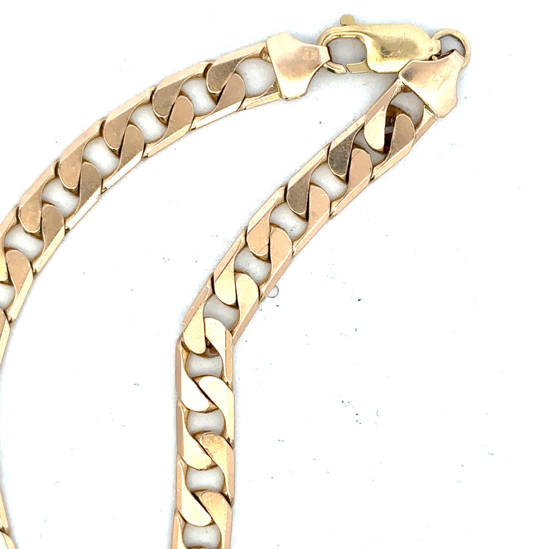9ct yellow gold curb bracelet weighing 14.5g, featuring classic linked chain design, unbranded jewelry piece.
