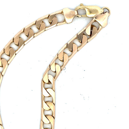 9ct yellow gold curb bracelet weighing 14.5g, featuring classic linked chain design, unbranded jewelry piece.