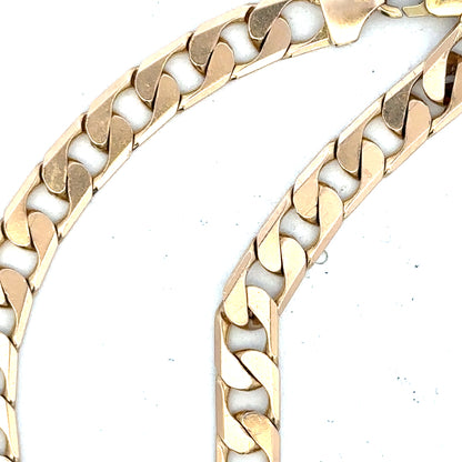 9ct yellow gold curb bracelet weighing 14.5g, featuring classic linked chain design, unbranded jewelry accessory.