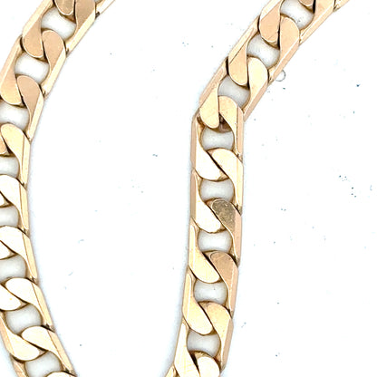 9ct yellow gold curb bracelet weighing 14.5g, featuring classic linked chain design, unbranded jewelry accessory.