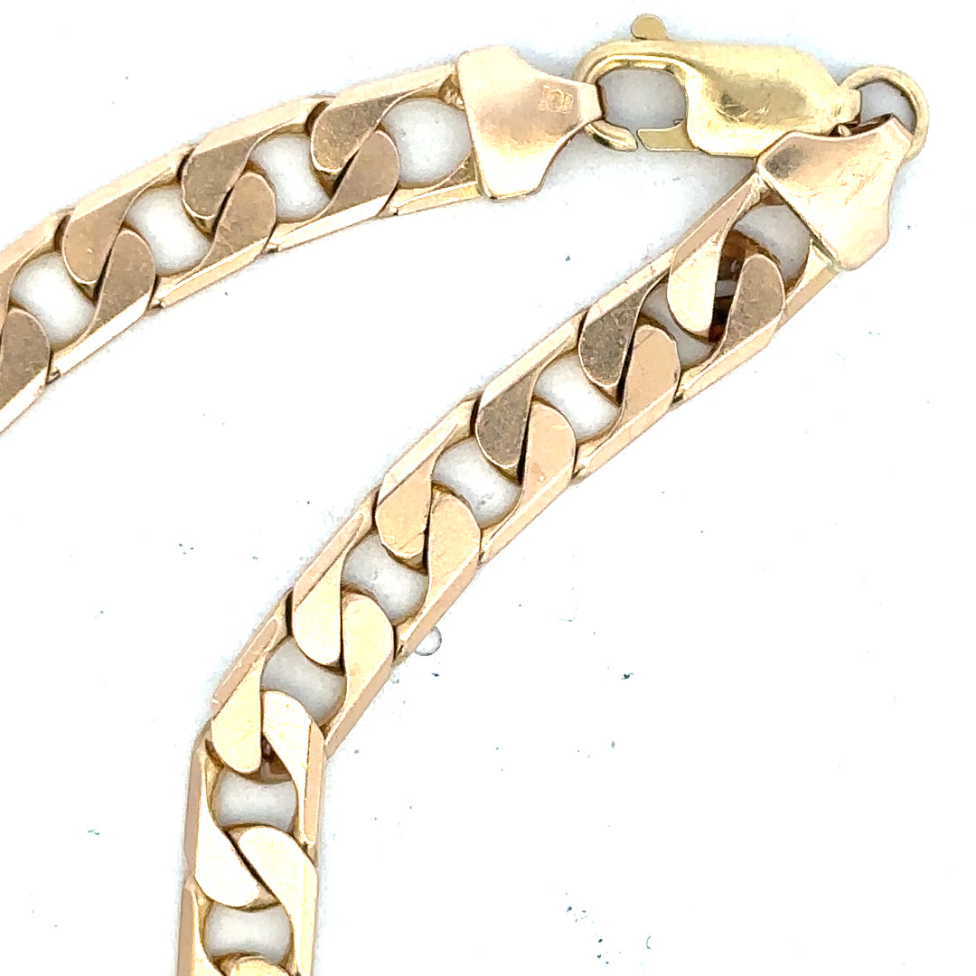 9ct yellow gold curb bracelet weighing 14.5g, featuring linked gold chains, unbranded jewelry accessory for elegant style