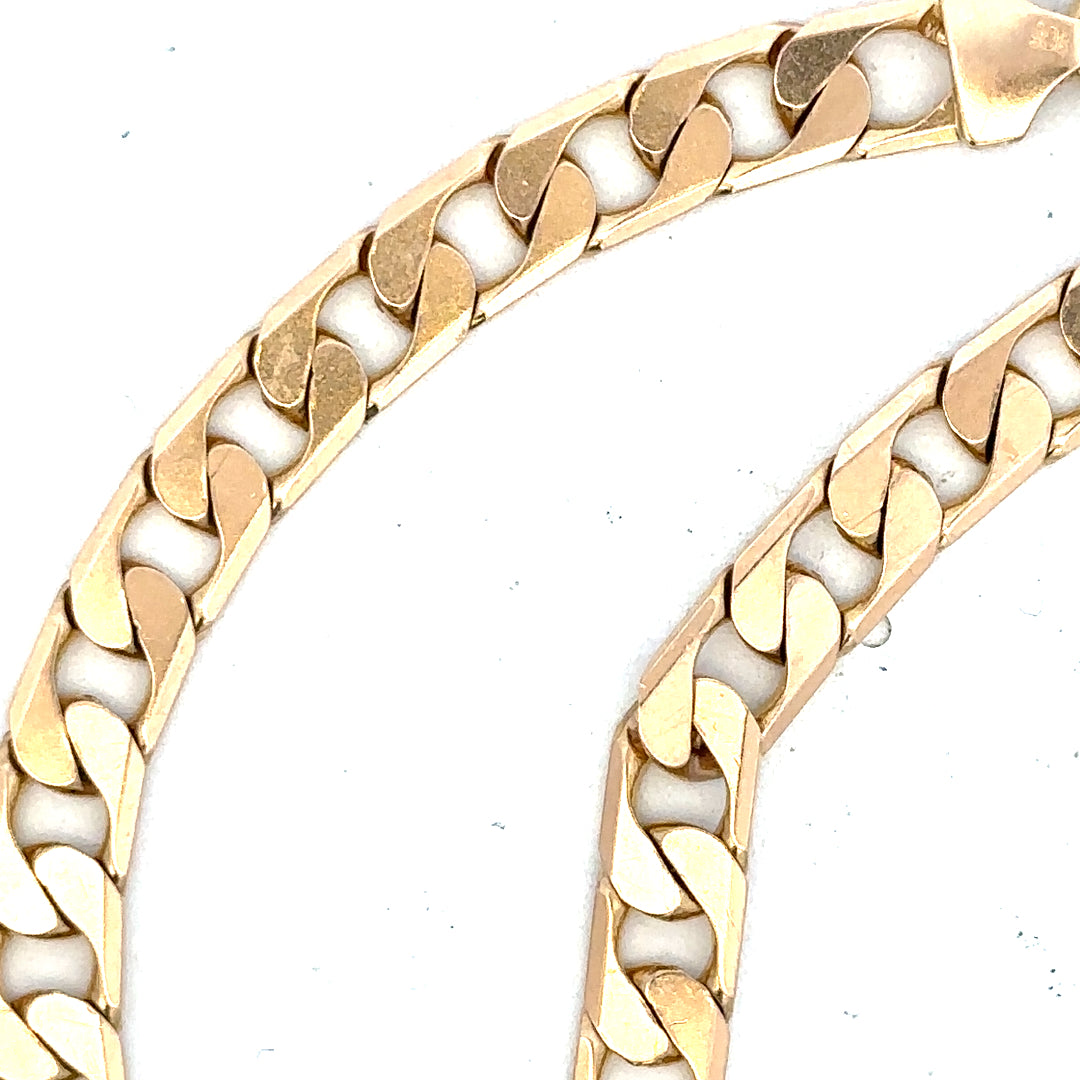 9ct yellow gold curb bracelet weighing 14.5g, featuring a classic chain design, unbranded jewelry accessory.