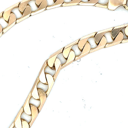 9ct yellow gold curb bracelet weighing 14.5g, featuring classic linked chain design, unbranded jewelry piece.