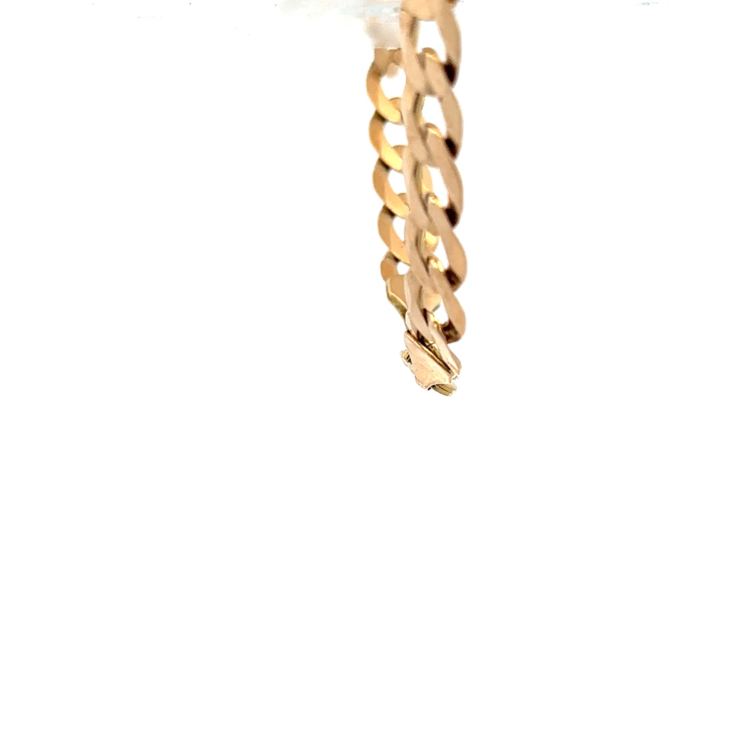 9ct yellow gold curb bracelet with a polished finish, weighing 15.5g, featuring interlinked oval links on a plain background.