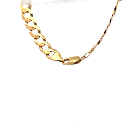 9ct yellow gold curb bracelet with a shiny finish, weighing 15.5g, featuring interlocking flat links for a stylish look.