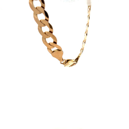 9ct yellow gold curb bracelet with a polished finish, weighing 15.5g, featuring linked gold curb chain design.