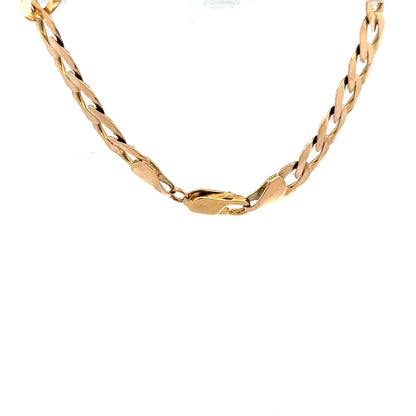 9ct yellow gold curb bracelet weighing 15.5g with polished links, unbranded jewelry accessory.