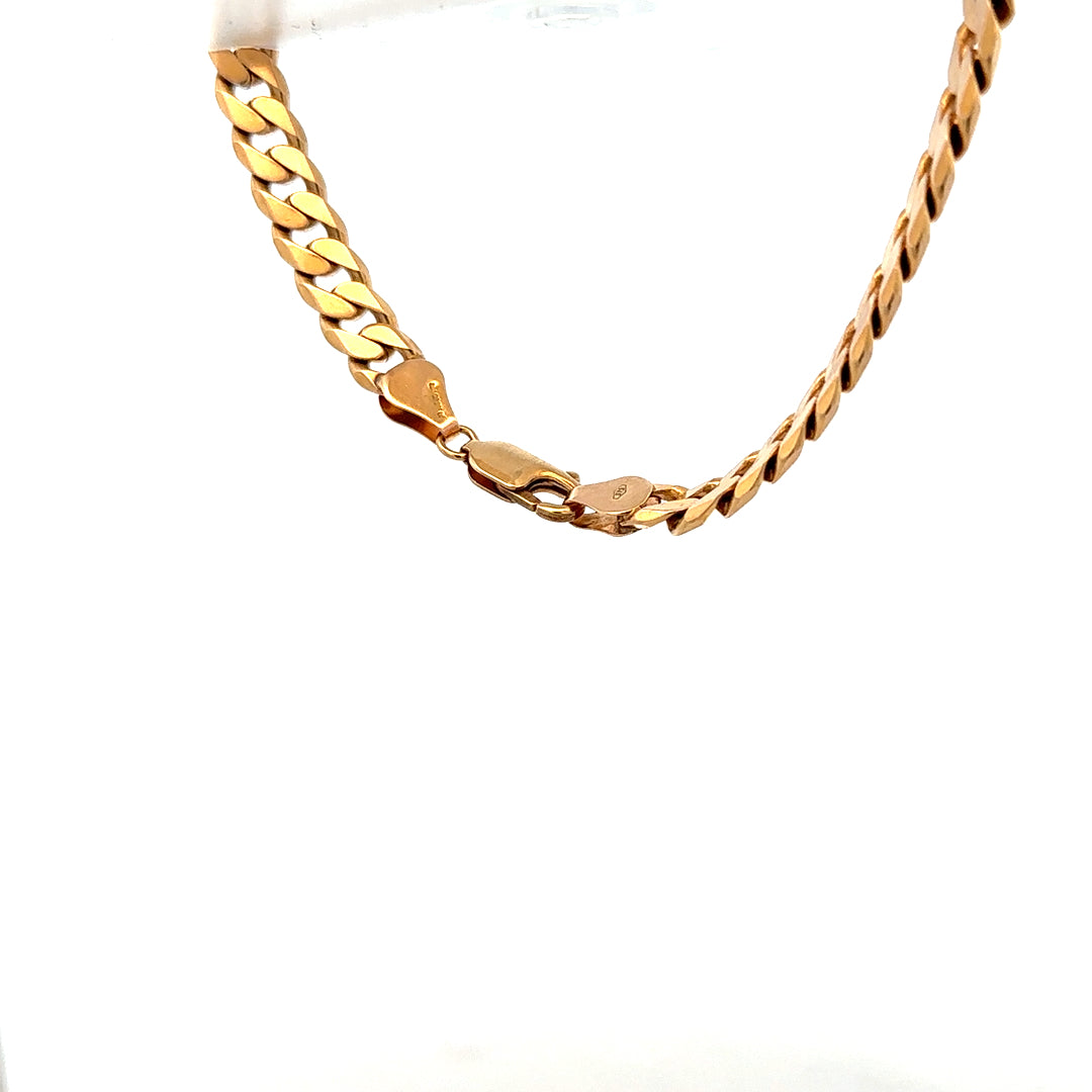 9ct yellow gold curb bracelet weighing 17.1g, featuring classic interlinked chain design, unbranded jewelry accessory.