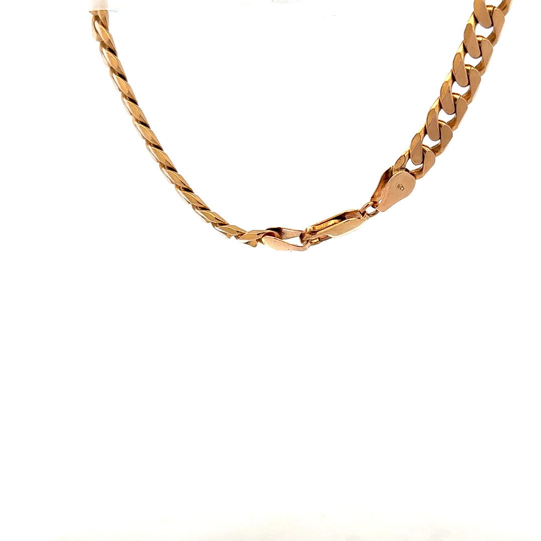 9ct yellow gold curb bracelet weighing 17.1g, featuring interlinked flat oval links, unbranded jewelry accessory.