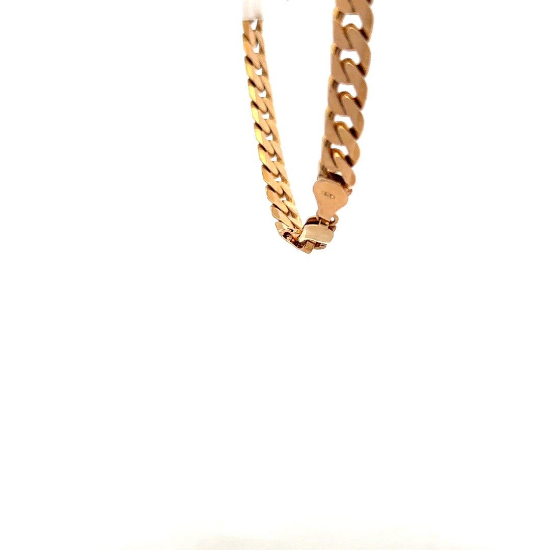 9ct yellow gold curb bracelet weighing 17.1g, featuring classic interlinked chain links and a polished finish.
