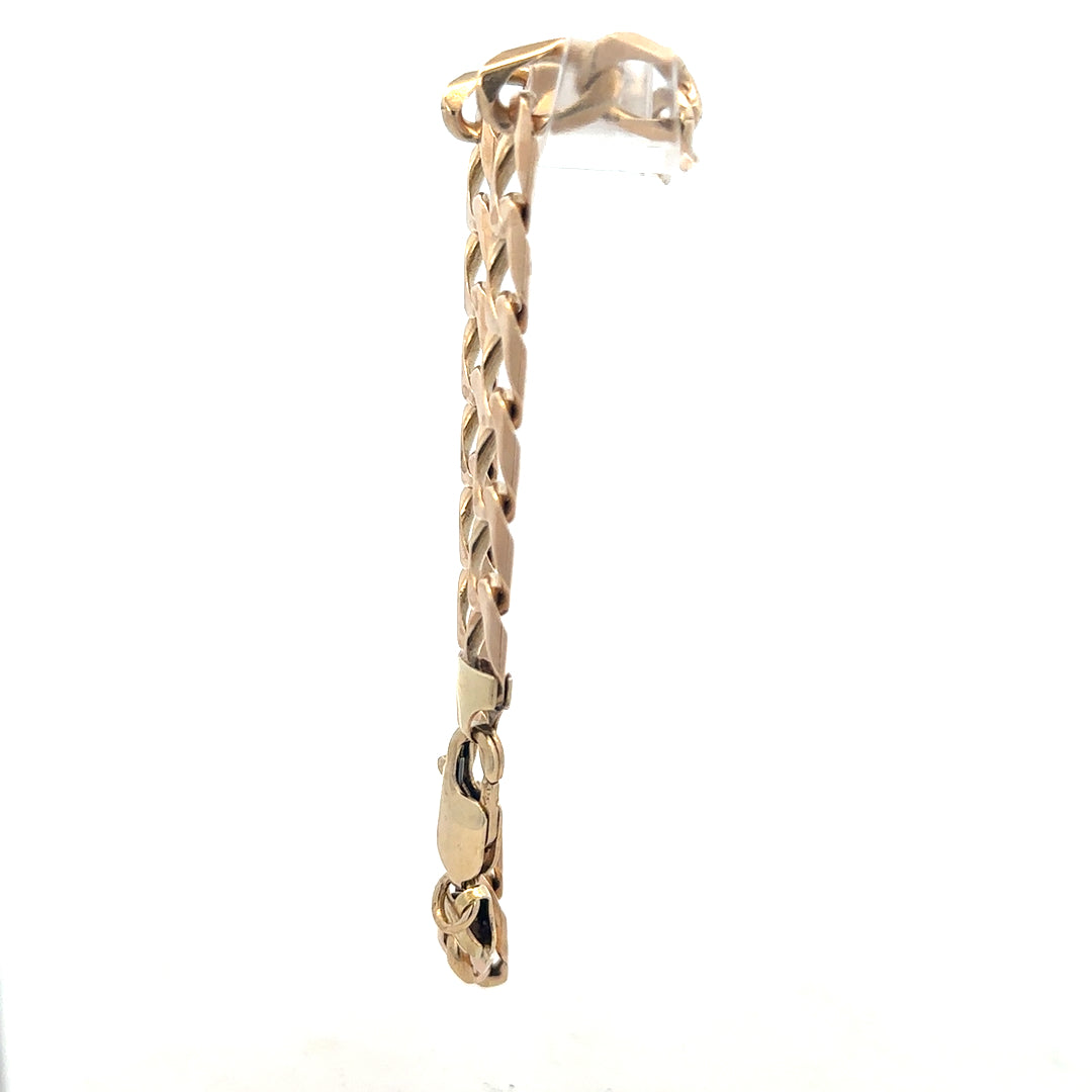 9ct yellow gold curb bracelet weighing 18.3g, featuring classic linked chain design, unbranded jewelry accessory.