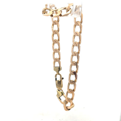9ct yellow gold curb bracelet weighing 18.3g, featuring classic linked chain design, unbranded jewelry accessory.