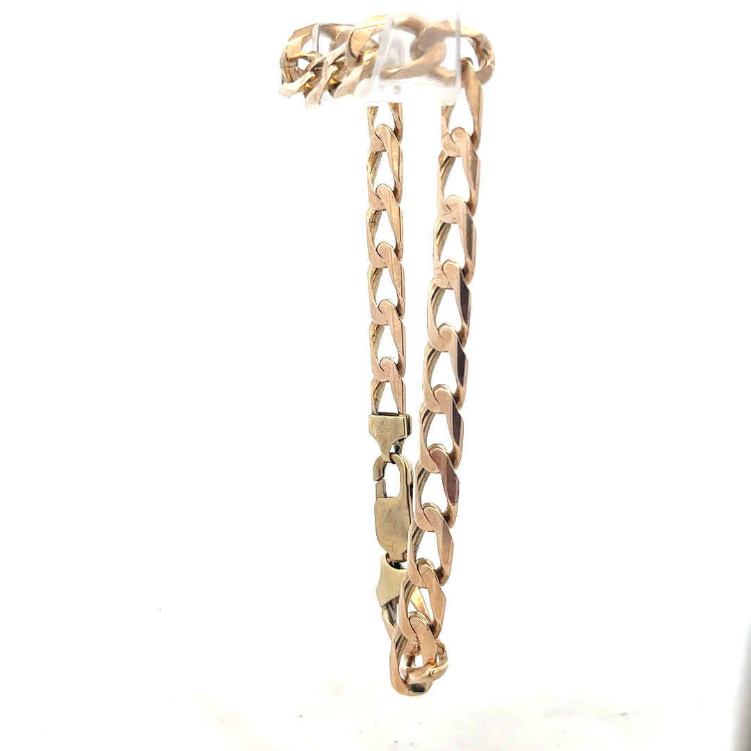 9ct yellow gold curb bracelet weighing 18.3g, featuring classic linked chain design, unbranded jewelry piece.