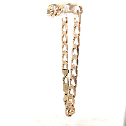9ct yellow gold curb bracelet weighing 18.3g, featuring classic linked chain design, unbranded jewelry piece.