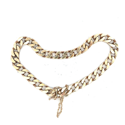 9ct yellow gold curb bracelet with 20g weight, showcasing a classic chain design on a plain background.