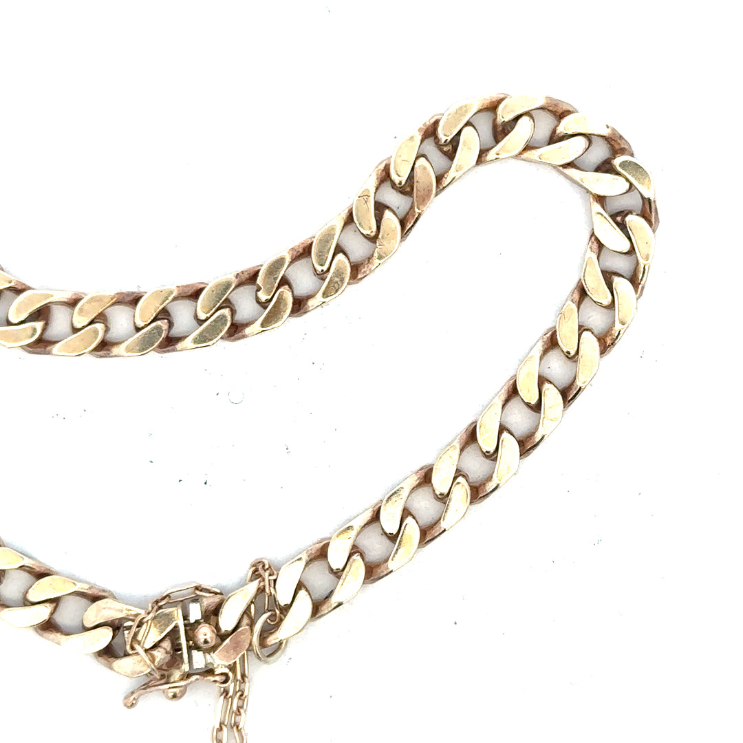 9ct yellow gold curb bracelet weighing 20g, featuring a classic chain design with secure clasp, unbranded jewelry piece.