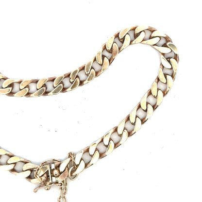 9ct yellow gold curb bracelet weighing 20g, featuring a classic chain design with secure clasp, unbranded jewelry piece.