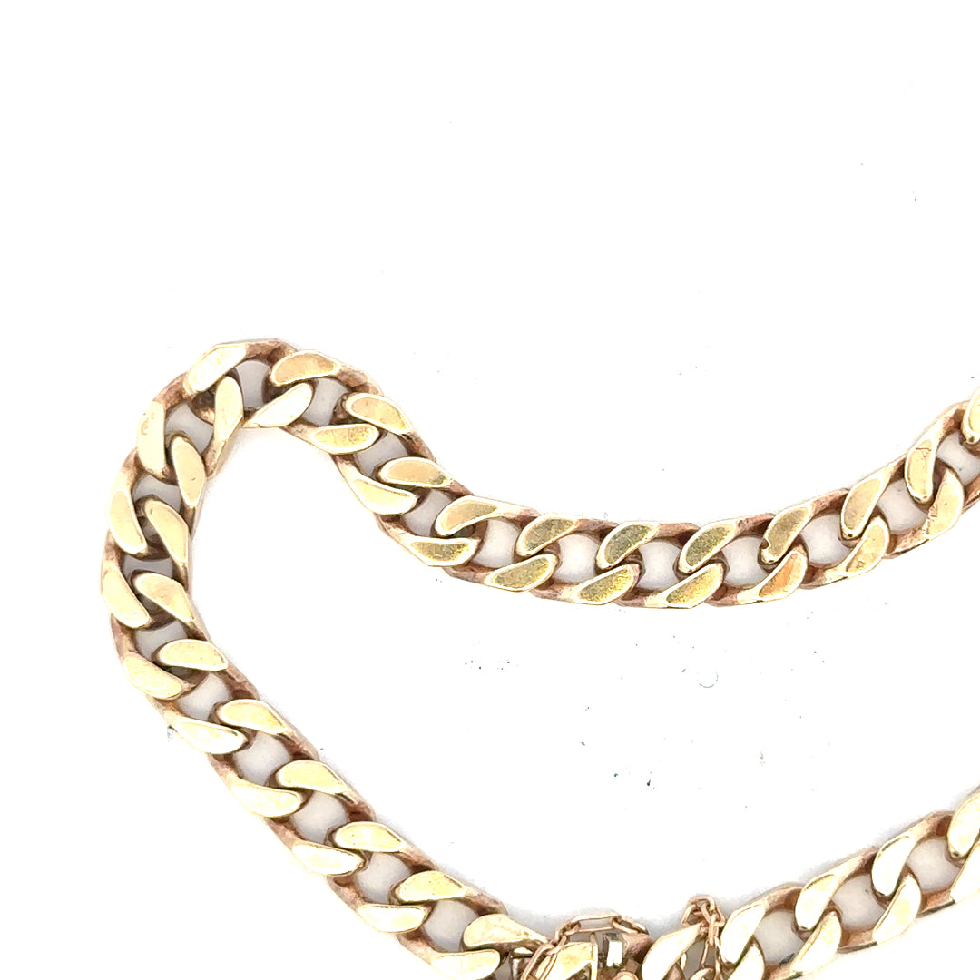 9ct yellow gold curb bracelet with a 20g weight, featuring a classic linked chain design.