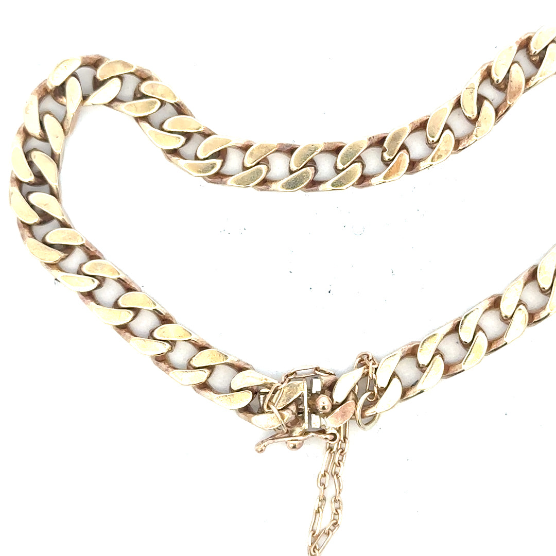9ct yellow gold curb bracelet with 20g weight, featuring classic linked chain design, unbranded jewelry accessory.