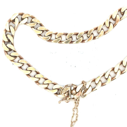 9ct yellow gold curb bracelet with 20g weight, featuring classic linked chain design, unbranded jewelry accessory.