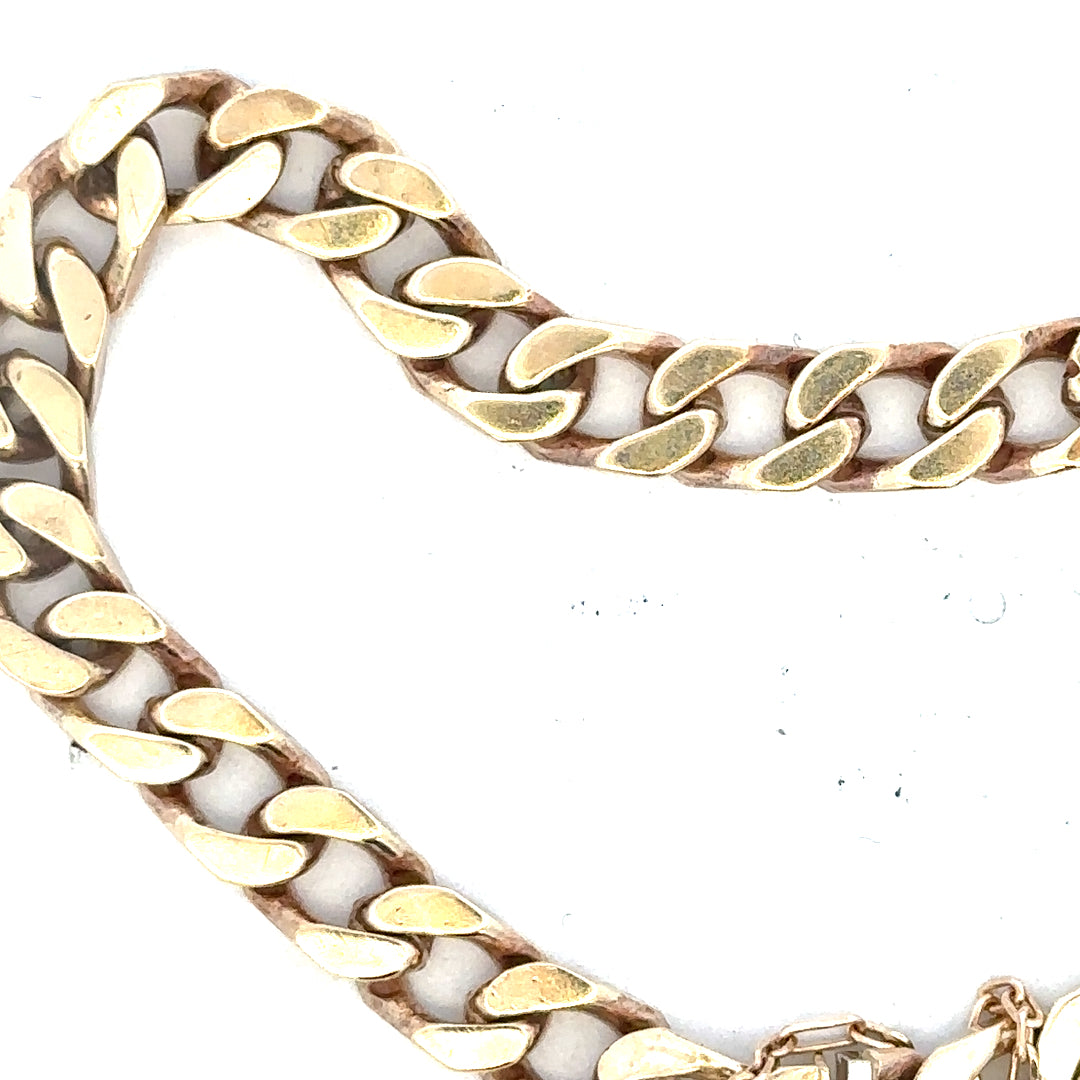 9ct yellow gold curb bracelet weighing 20g, featuring classic linked chain design, unbranded jewelry accessory.