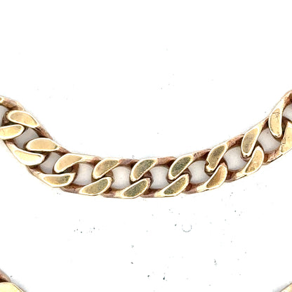 9ct yellow gold curb bracelet weighing 20g, featuring a classic chain design, unbranded, shown on a plain background.