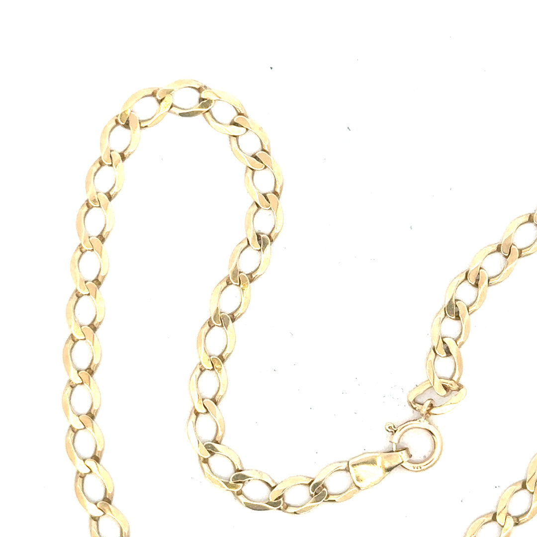 9ct yellow gold curb bracelet weighing 3.9g, unbranded jewelry with classic link design, displayed on a neutral background.