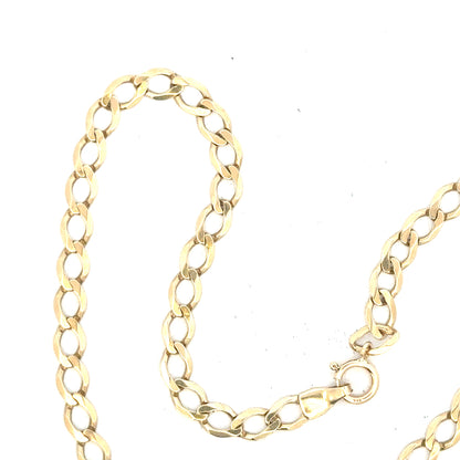 9ct yellow gold curb bracelet weighing 3.9g, unbranded jewelry with classic link design, displayed on a neutral background.
