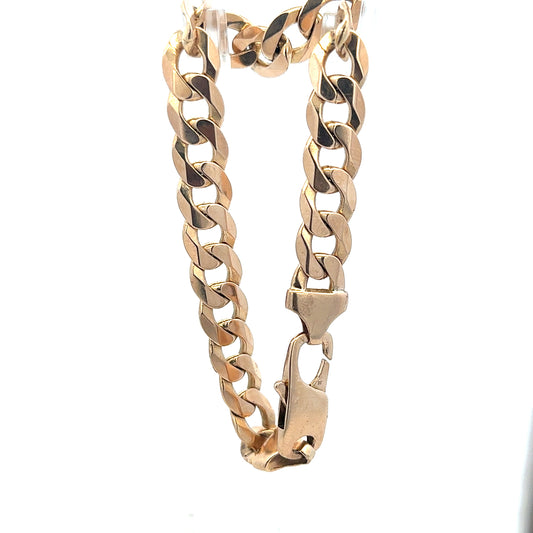 9ct yellow gold curb bracelet weighing 31.9g, unbranded, featuring a classic chain design and polished finish.