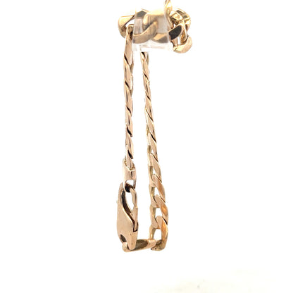 9ct yellow gold curb bracelet weighing 31.9g, unbranded, shown with detailed links and polished finish.