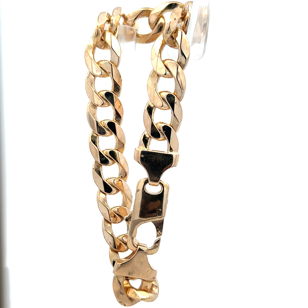 9ct yellow gold curb bracelet weighing 47.5g, unbranded jewelry with a classic chain link design.