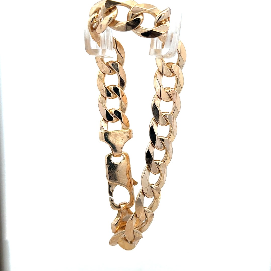 9ct yellow gold curb bracelet with a 47.5g weight, showcasing a classic linked chain design on a plain background.
