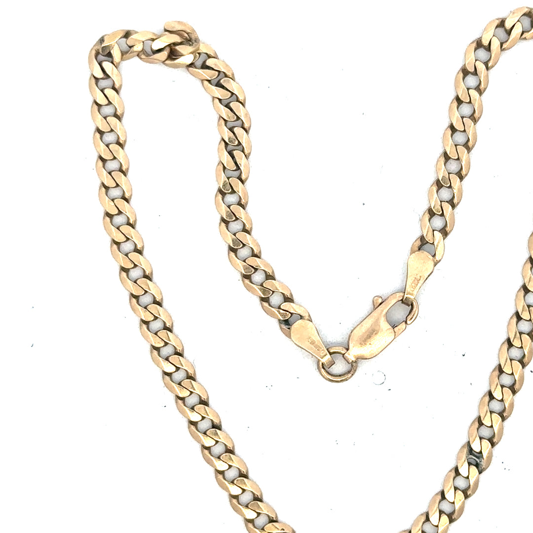 9ct yellow gold curb bracelet weighing 5.2g, featuring a classic chain design with polished links.