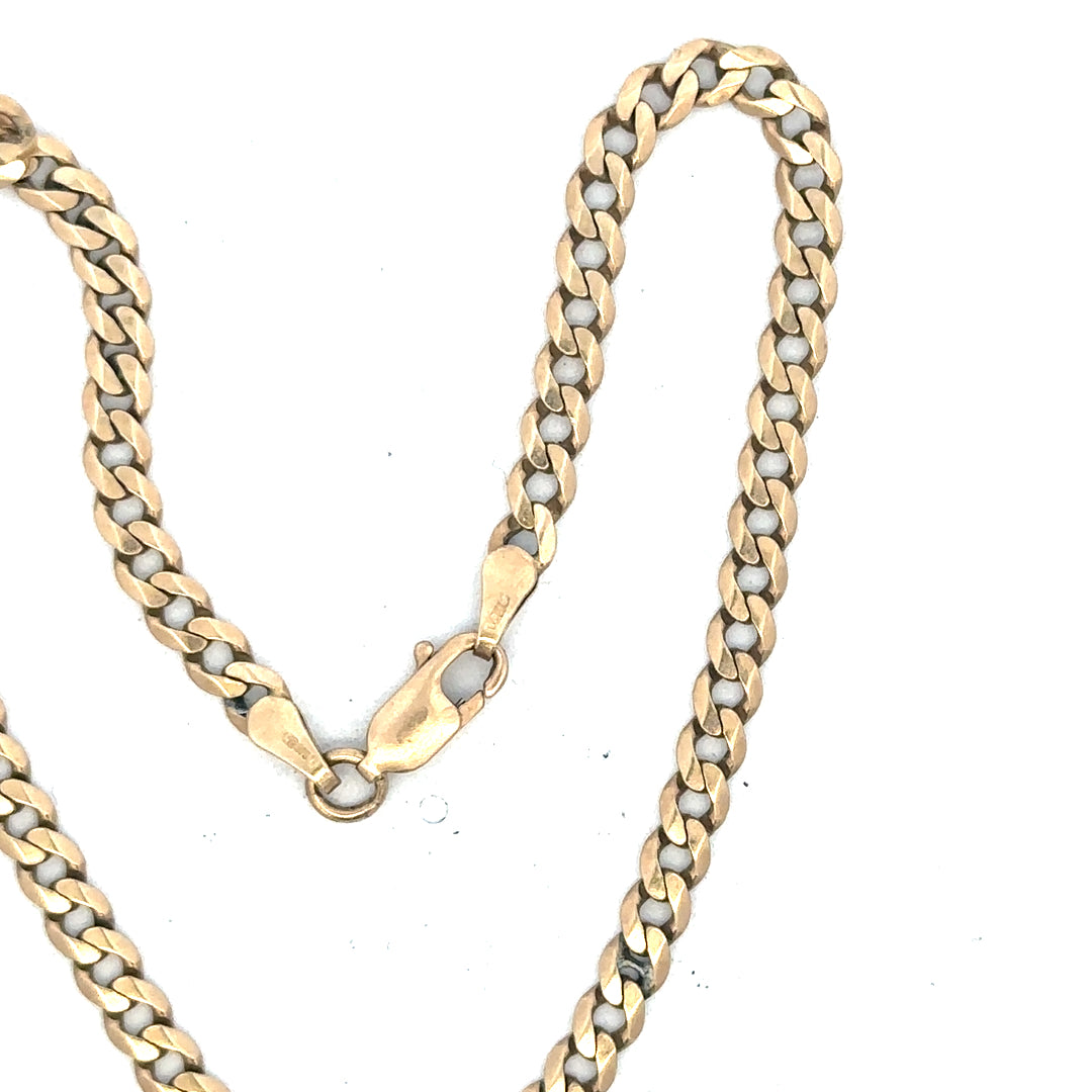 9ct yellow gold curb bracelet weighing 5.2g, unbranded, with a classic chain design visible in the image.