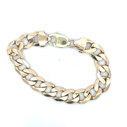 9ct yellow gold curb bracelet with a polished finish, weight 52.6g, showcasing a classic chain design.